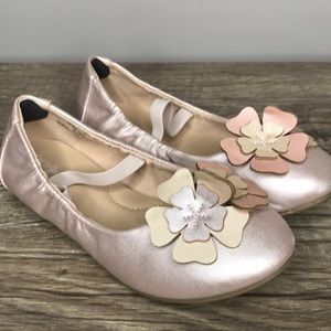 Pink girls flats with leather flowers